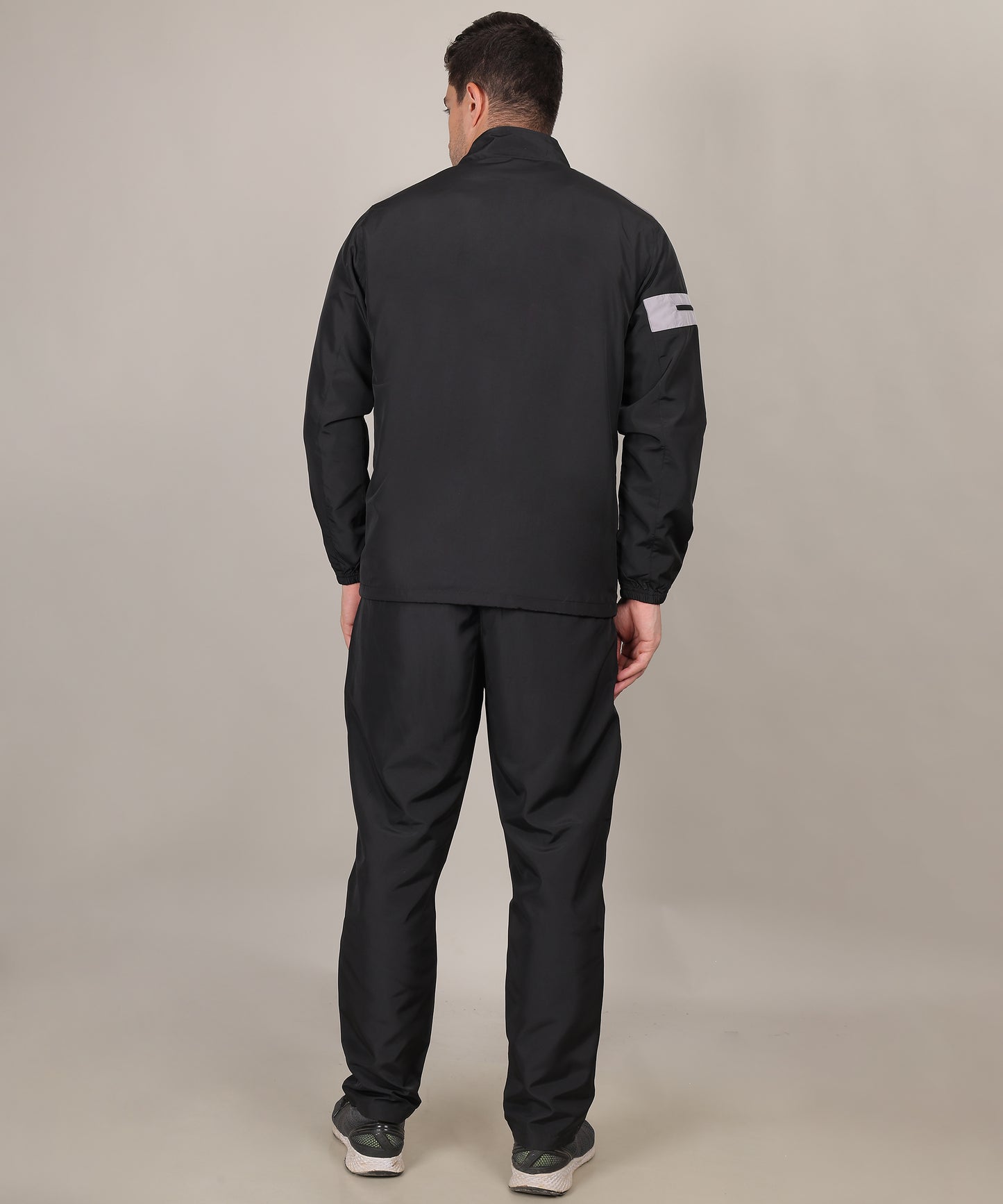 men wearing black track suite