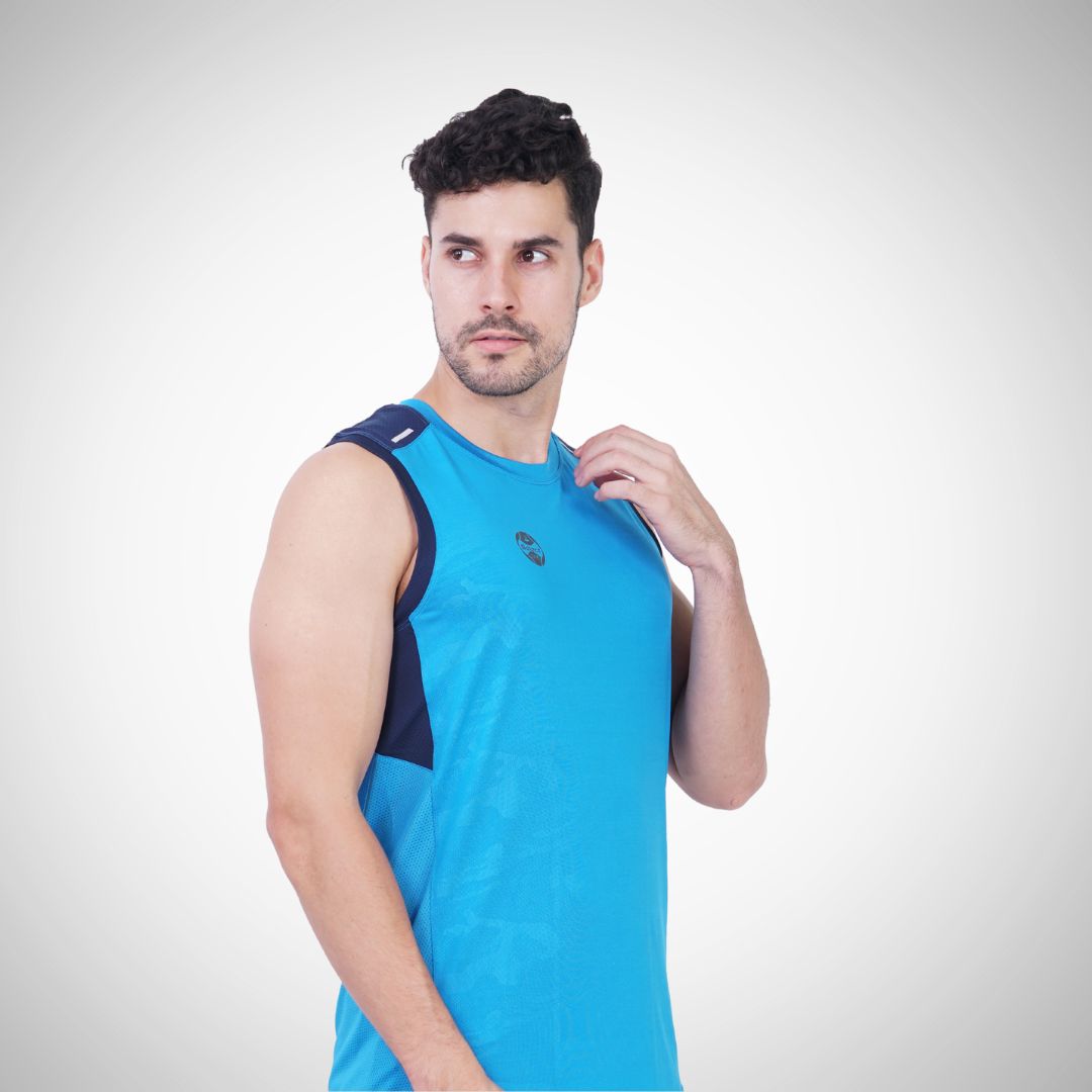 Man wearing a blue sleeveless shirt with navy accents on a white background