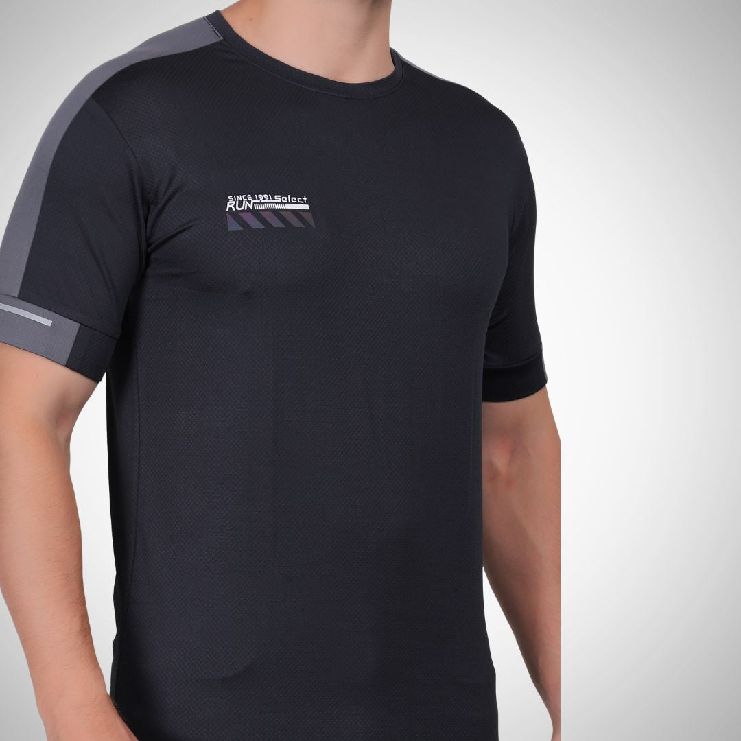 Black t-shirt with a logo on the chest against a white background