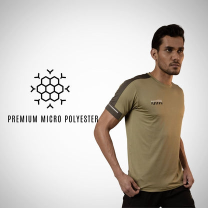 Man wearing a beige t-shirt with a logo and text on a white background