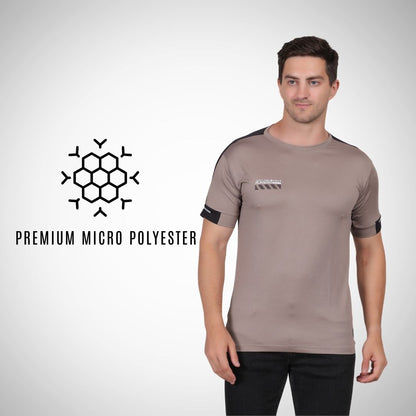 Man wearing a brown athletic shirt with a logo and text on a white background