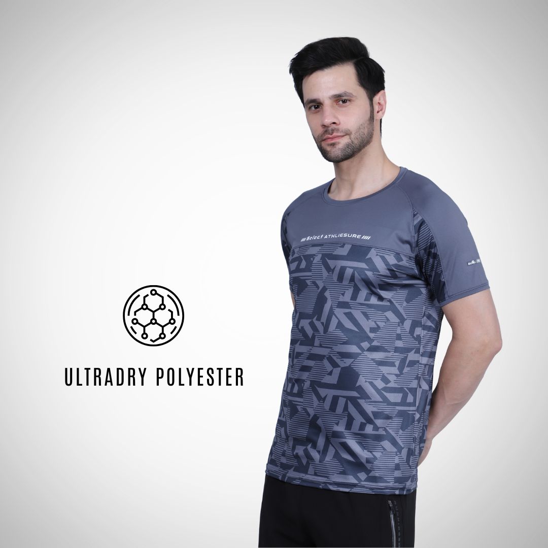 Man wearing a blue patterned t-shirt on a white background