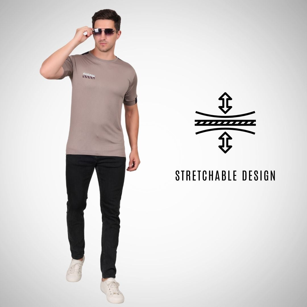 Man wearing a brown t-shirt and black pants with sunglasses, standing against a white background with 'Stretchable Design' text.