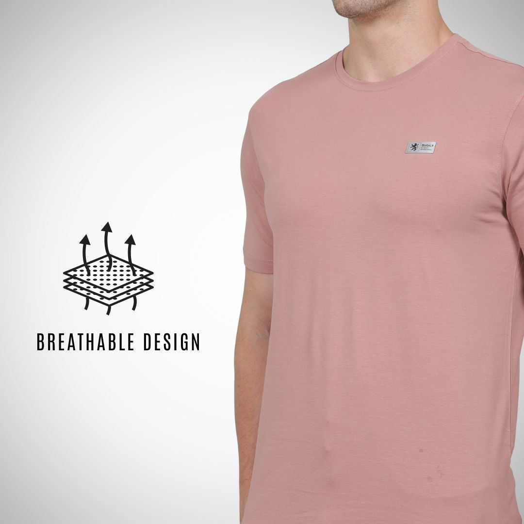 Person wearing a pink t-shirt with a breathable design feature highlighted on a white background