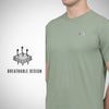 Green t-shirt with breathable design feature on a white background