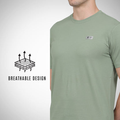 Green t-shirt with breathable design feature on a white background