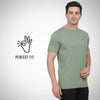 Man wearing a green t-shirt with 'Perfect Fit' logo on a white background