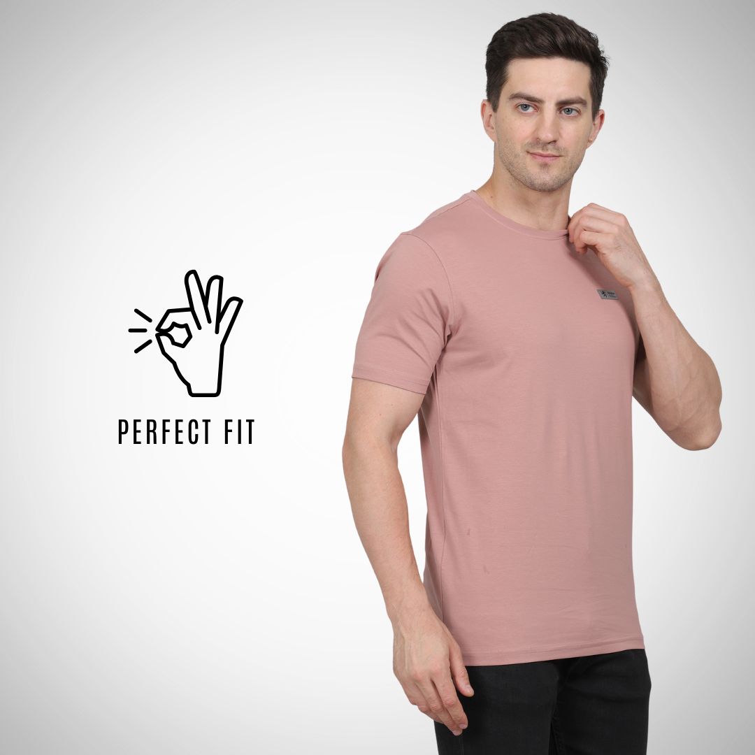 Man wearing a pink t-shirt with 'Perfect Fit' logo on a white background